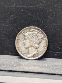 1925 D Mercury Dime. A key date in high grade with EF/AU detail.