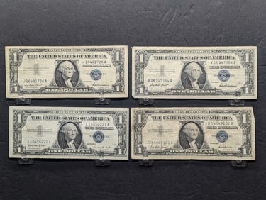 (3) 1957, (1) 1957-B Series $1 Silver Certificates