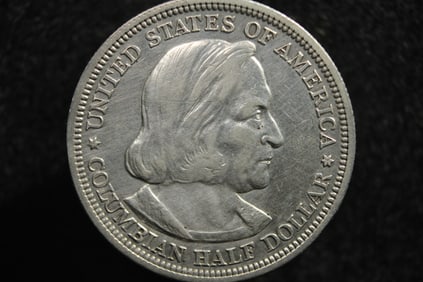 1892 Columbian Commemorative Silver Half Dollar.  OBV: Portrait Of Christopher Columbus.  REV: Santa