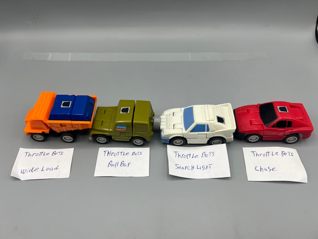 Lot of (4) 1987 Transformers G1 Throttle Bots Figures - Wide Load, Rollbar, Seachlight, & Chase (1 of 7)