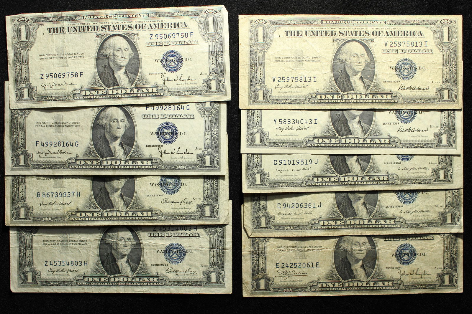 Nine 1935 $1 Silver Certificates. One 35 C, two 35 D, two 35 E, two 35 F, and two 35 G. Circulated. (1 of 4)
