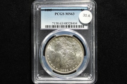 1885 Morgan Dollar. Slabbed by PCGS, top grader, as MS 63.