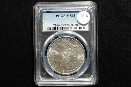 1886 Morgan Dollar. Slabbed by PCGS, top grader, as MS 63.
