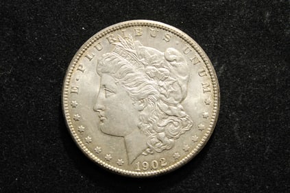1902-O Morgan Dollar. Uncirculated with toned reverse. Lustrous.