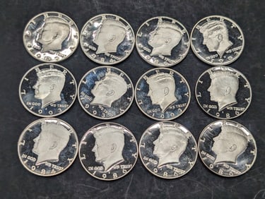 Lot of 12 Various Dated Proof Kennedy Half Dollars in UNC Condition