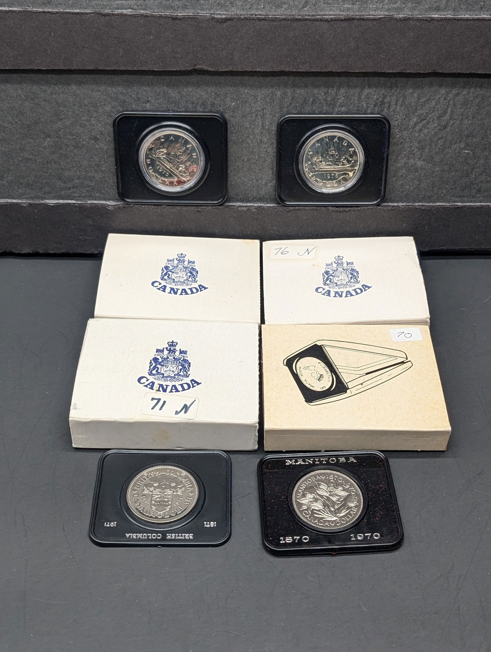 Lot of Four 1970's Canadian Dollars in OGP (1 of 2)