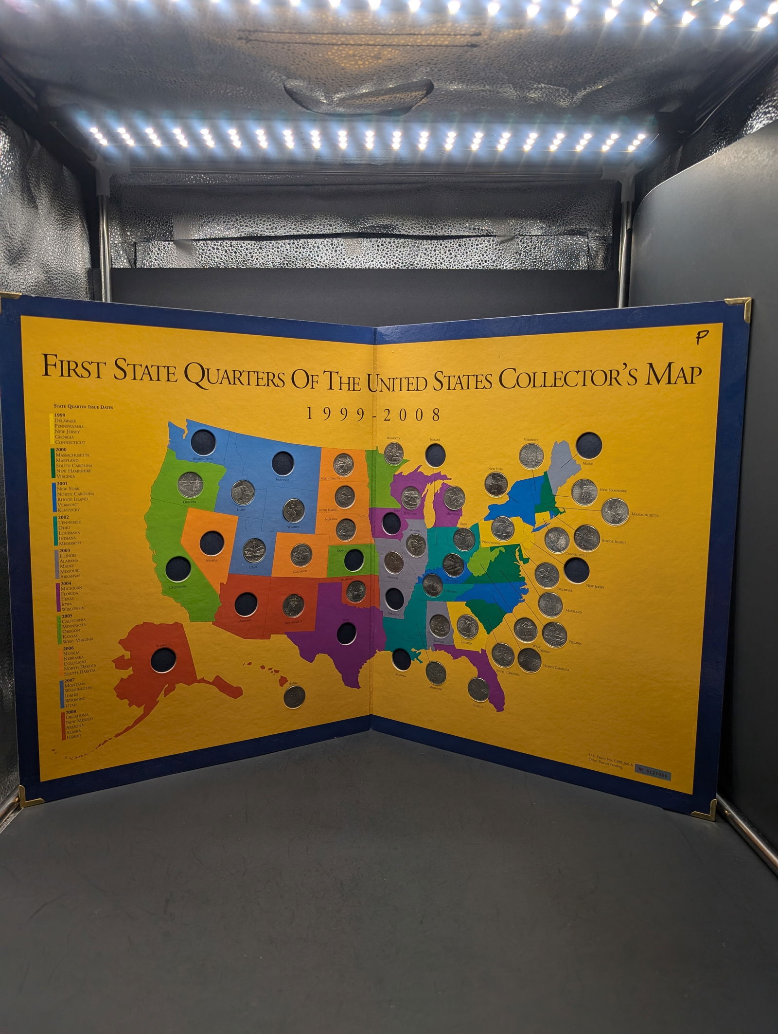 Statehood Quarters Collector's Map Album w/ 36 P Mint Quarters (1 of 3)