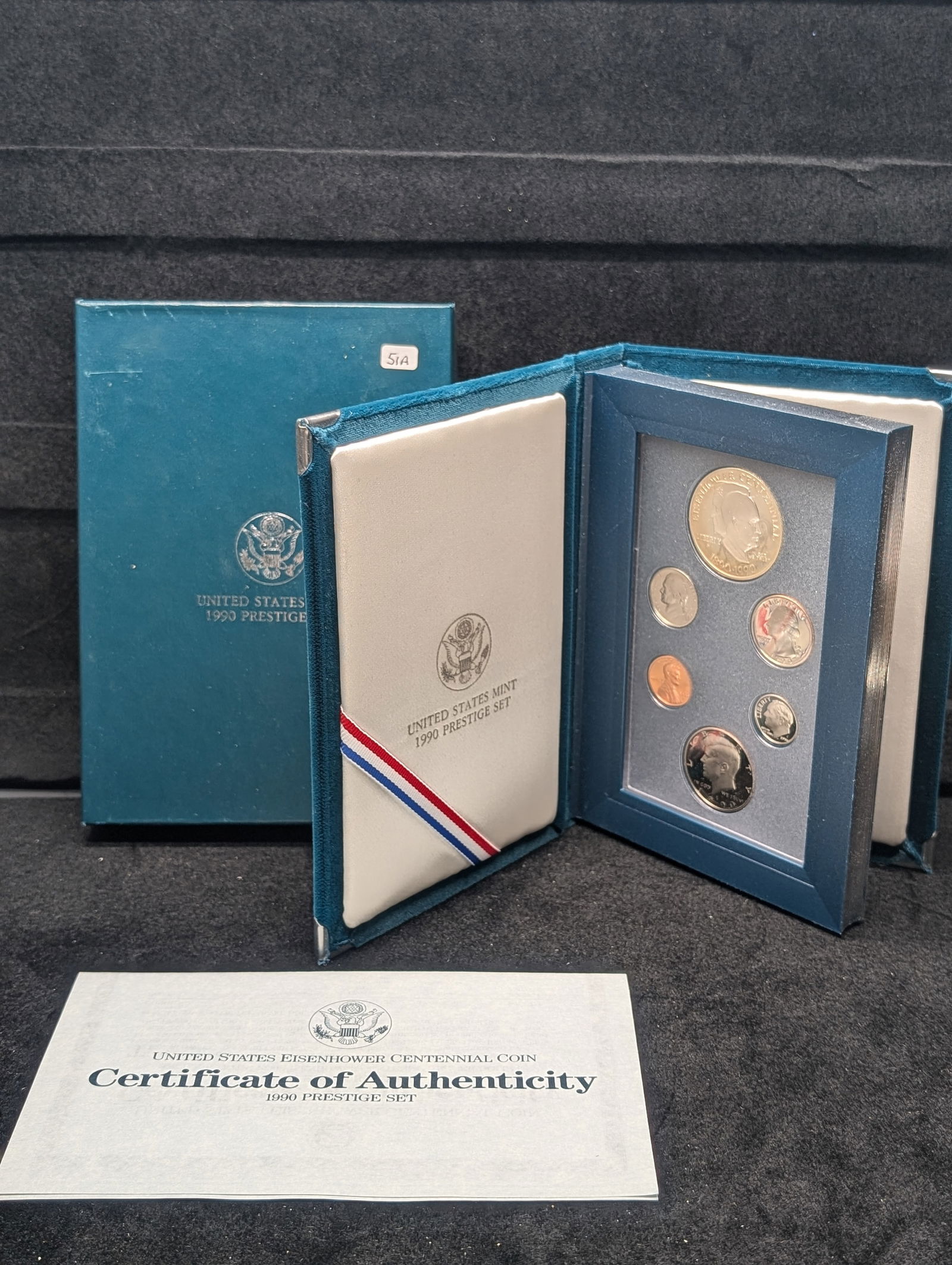 1990-S Prestige Proof Set. Includes regular coins plus a silver Eisenhower commemorative $1. (1 of 4)