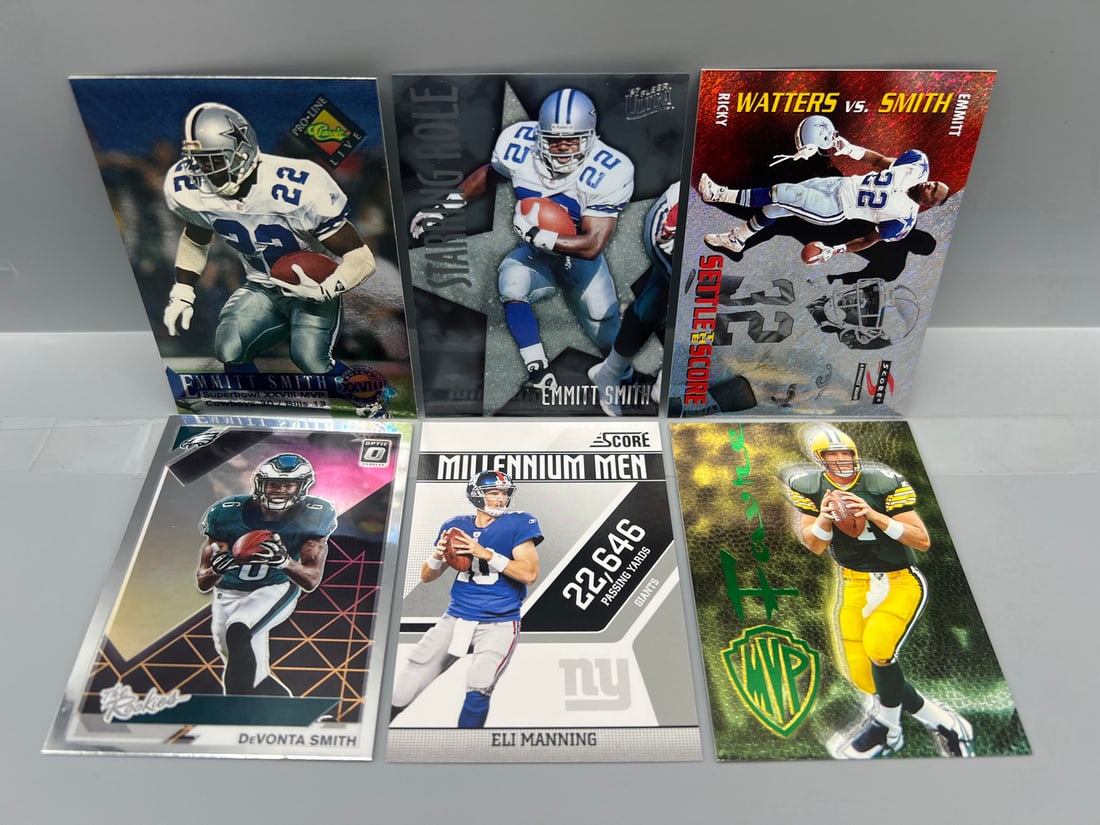 Lot of (6) Assorted Football Star Player Cards - Varying Conditions - Emmitt Smith, Eli Manning,: Lot of (6) Assorted Football Star Player Cards - Varying Conditions - Emmitt Smith, Eli Manning, Brett Favre
