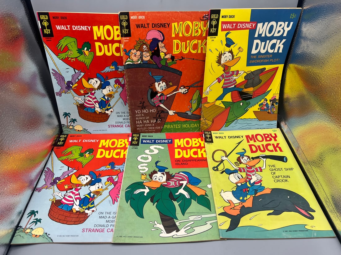Lot of (6) Assorted Walt Disney Moby Duck Comic Books - Varying Conditions: Lot of (6) Assorted Walt Disney Moby Duck Comic Books - Varying Conditions
