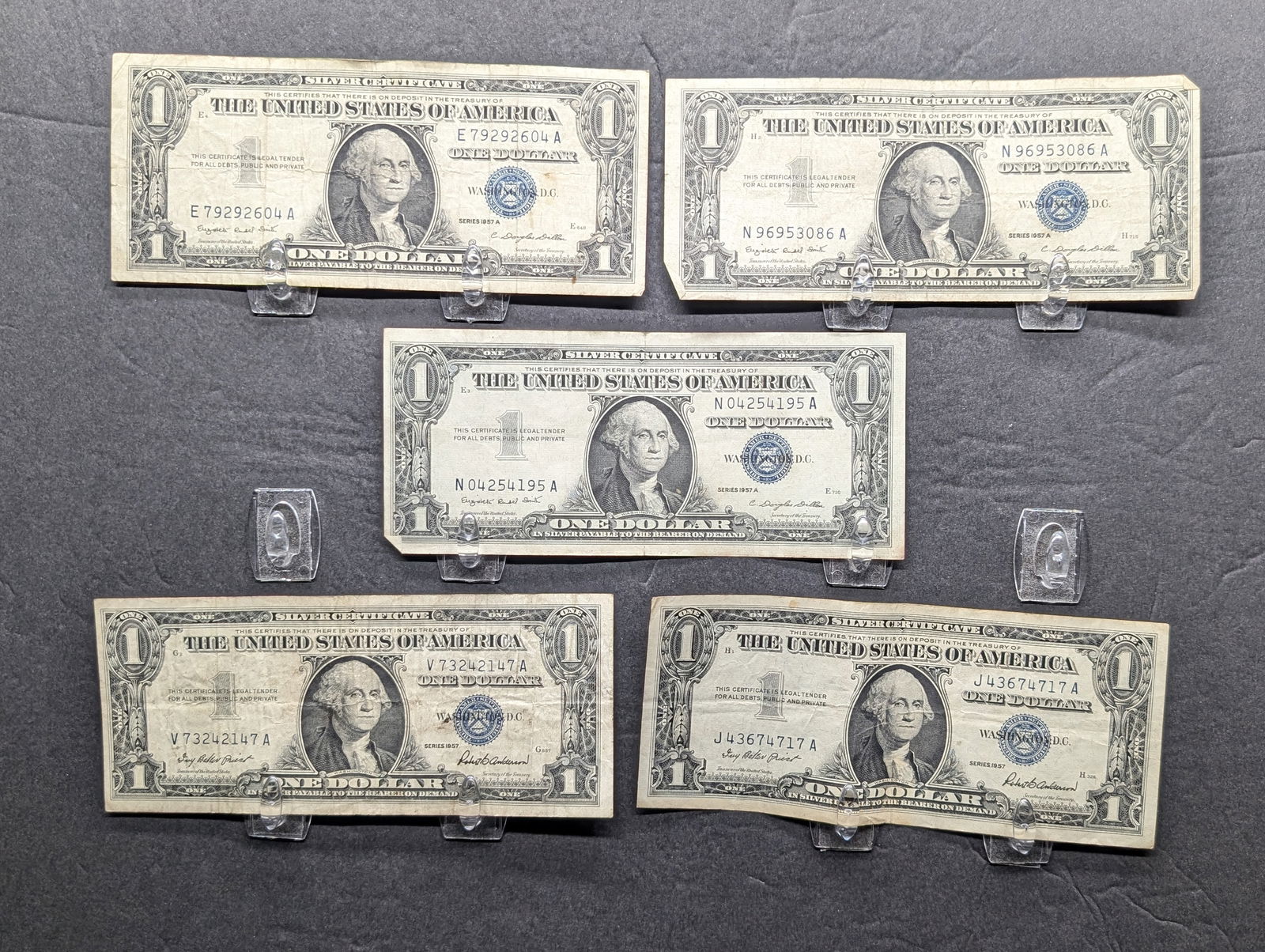 **VF** (2) 1957, (3) 1957-A Series $1.00 Silver Certificates (1 of 4)
