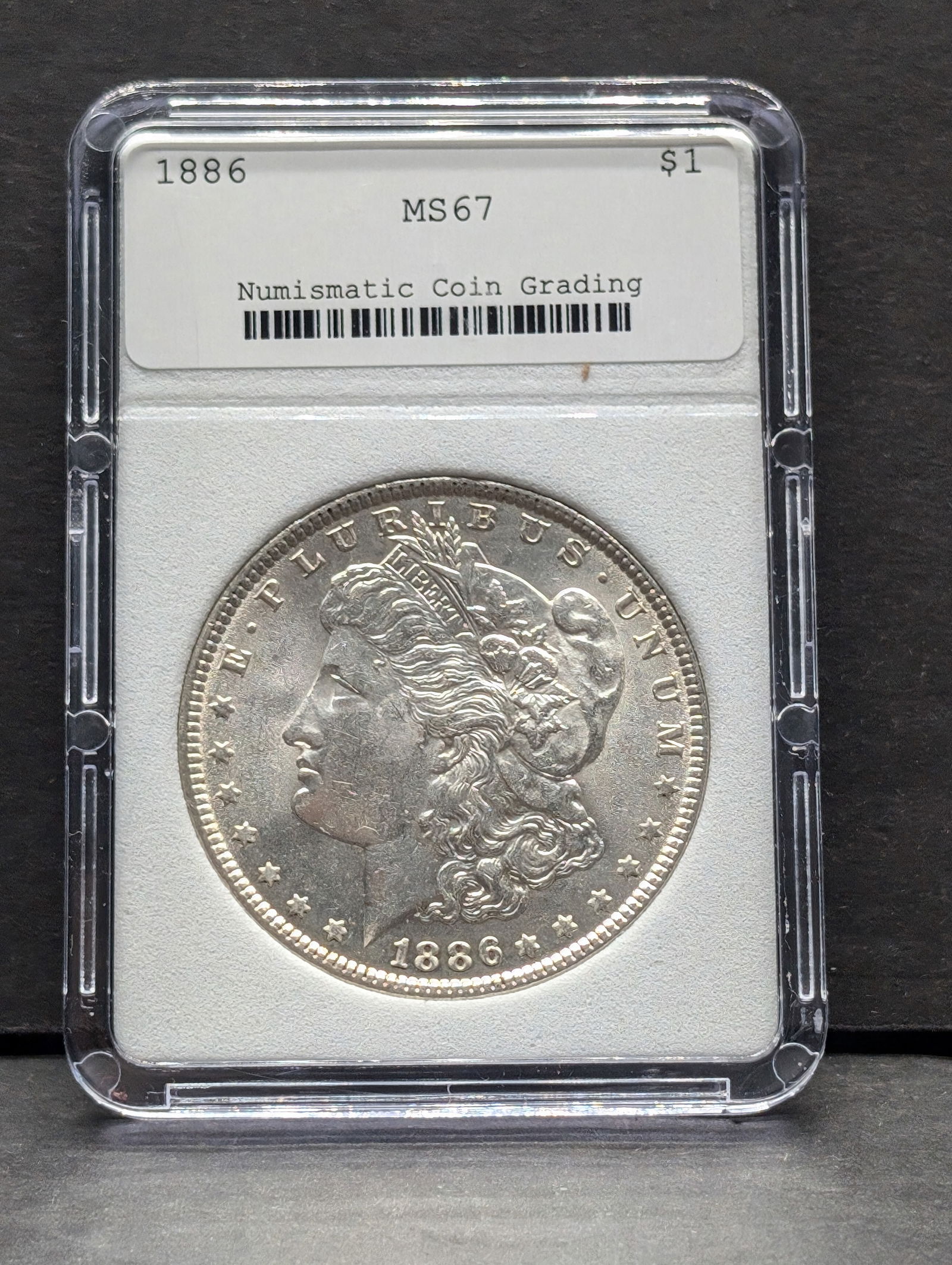1886 Morgan Silver Dollar - NCG Cert. MS67 (1 of 3)