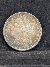 1897 Morgan Silver Dollar - UNC - Rainbow Toning