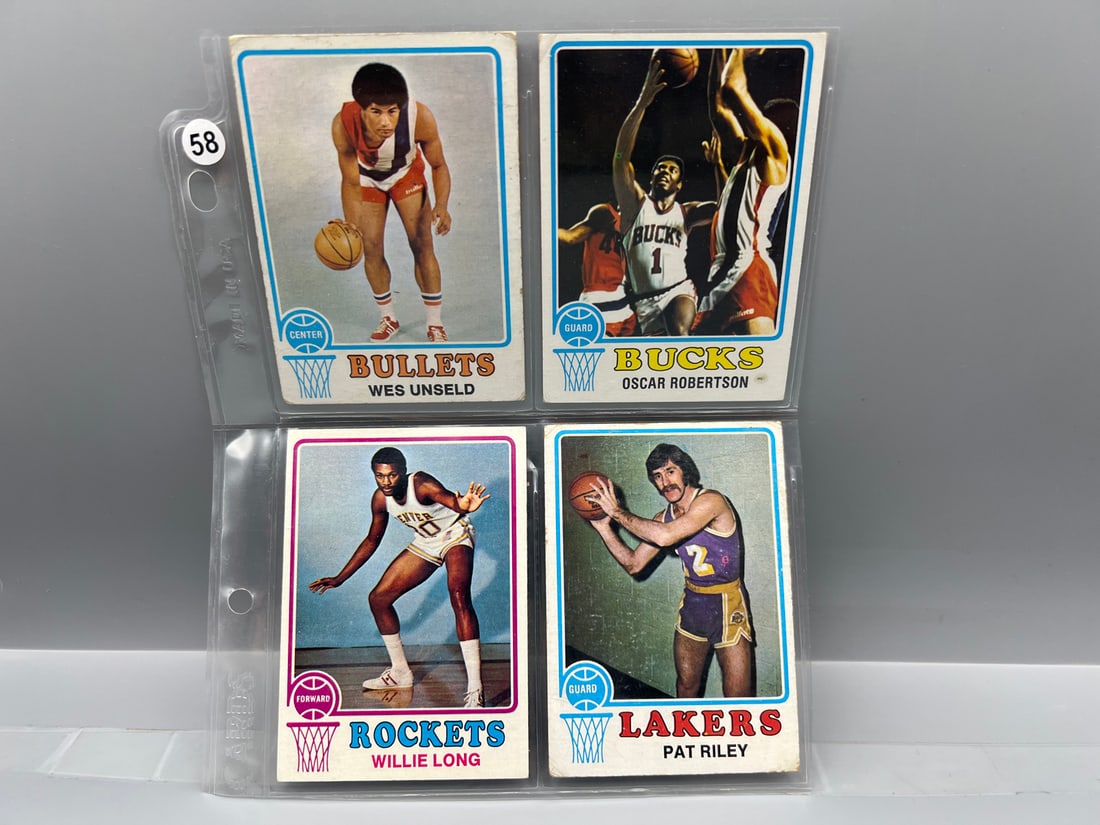 Lot of (4) 1973-74 Topps Basketball Star Player Cards - Varying Conditions - Oscar Robertson, Wes: Lot of (4) 1973-74 Topps Basketball Star Player Cards - Varying Conditions - Oscar Robertson, Wes Unseld, Pat Riley