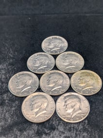 Eight 1972-P Kennedy Half Dollars