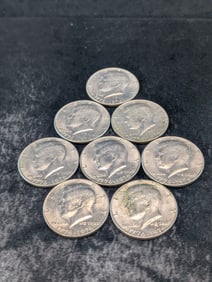 Eight 1976-P Kennedy Half Dollars