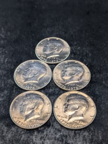 Five 1976-D Kennedy Half Dollars. BU