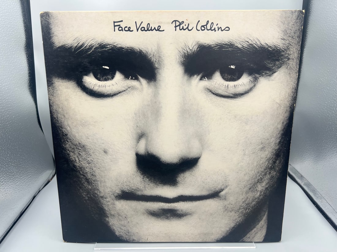 Phil Collins: Face Value (1981), gatefold, previous owner sticker on label/back cover: Phil Collins: Face Value (1981), gatefold, previous owner sticker on label/back cover - Records have not been tested by the auction house for play quality. All items are sold as is.