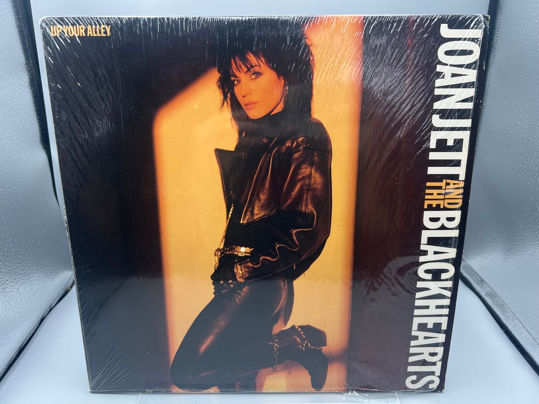Joan Jett and the Blackhearts: Up Your Alley (1988), in original shrinkwrap: Joan Jett and the Blackhearts: Up Your Alley (1988), in original shrinkwrap - Records have not been tested by the auction house for play quality. All items are sold as is.