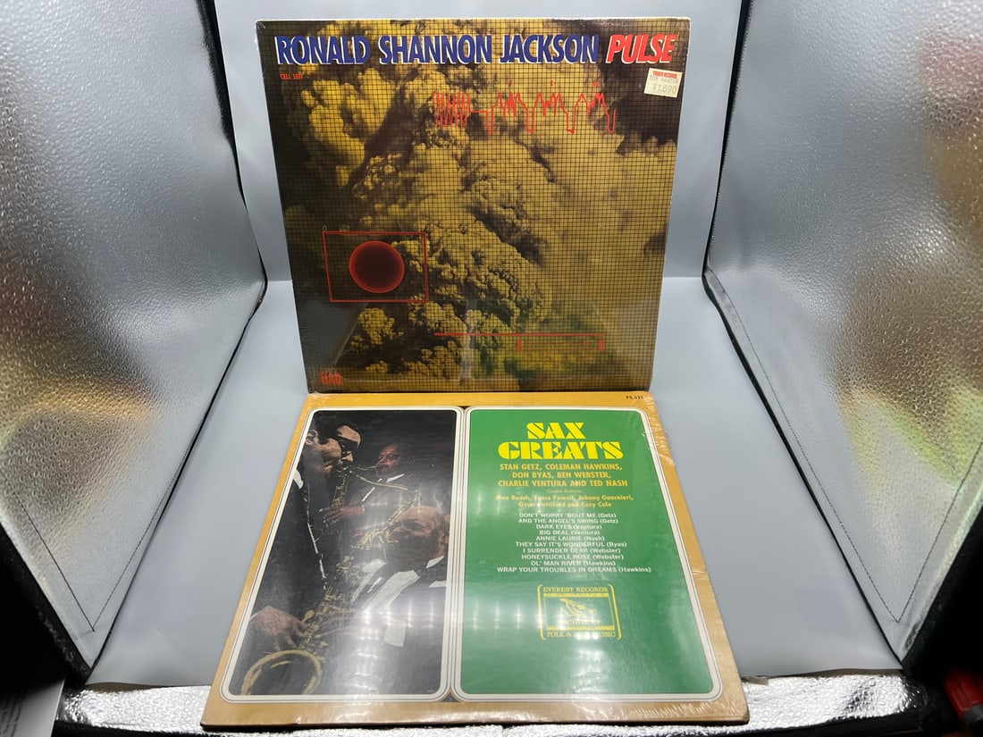 SEALED - Two (2) Jazz LP Lot - Ronald Shannon Jackson: Pulse (1984); and Sax Greats (1977), slight: SEALED - Two (2) Jazz LP Lot - Ronald Shannon Jackson: Pulse (1984); and Sax Greats (1977), slight tear in shrinkwrap but still tightly sealed. Both records are SEALED. - Records have not been tested 