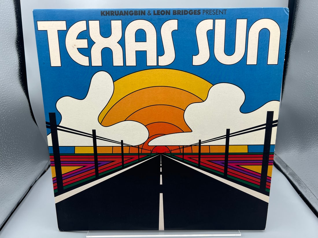 Khruangbin & Leon Bridges: Texas Sun (2020), limited edition, orange translucent vinyl: Khruangbin & Leon Bridges: Texas Sun (2020), limited edition, orange translucent vinyl - Records have not been tested by the auction house for play quality. All items are sold as is.