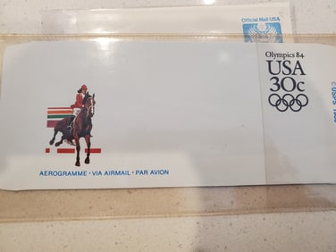 Four pieces including 1982 Postal Mint Card, 30 cent Olympics 1984 Aerogramme Envelope, 1982 30 cent