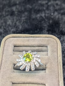 Woman's Sterling Silver Peridot Round Stone Size 10 Ring. Marked 925. Ring Weighs 0.22 Toz (0.09