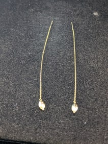 14kt yellow Gold Earrings. 0.7 grams.