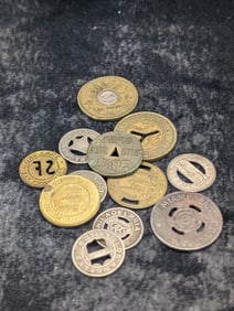 Twelve Assorted Transit Tokens