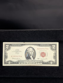 1963 Red Seal 2 Dollar Bill with good corners and no marks.