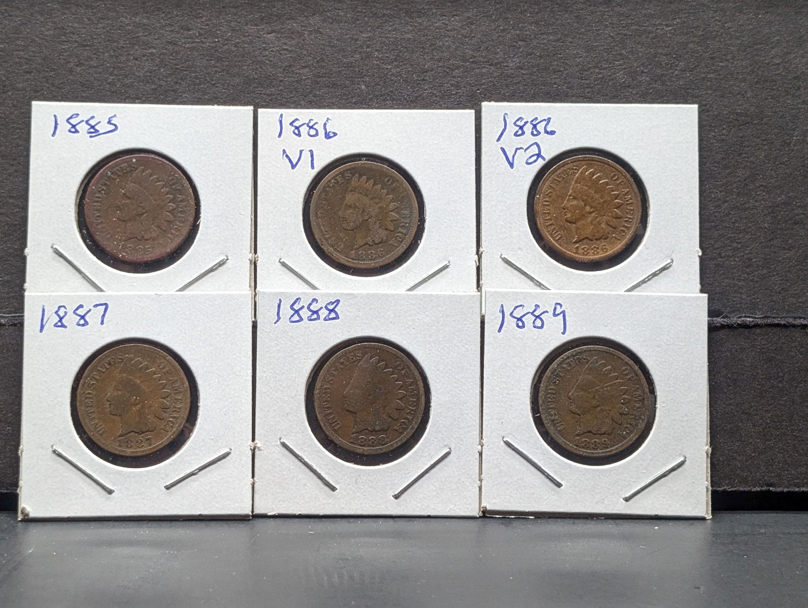 1885, 86 V1, 86 V2, 87, 88, and 89 Indian Head Cents. Average circulated. No culls/corrosion. 86 V2 (1 of 5)