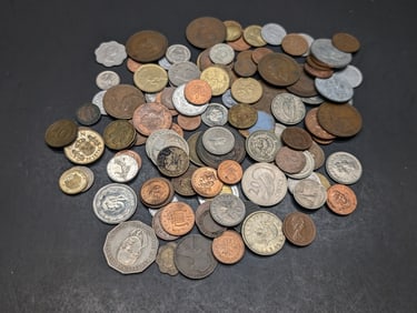 One pound plus foreign coins. Nice mix.?
