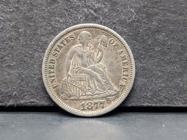 1877 Seated Liberty Dime. Choice XF and original.?