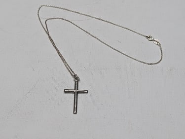 16 inch light sterling chain with Cross pendant.?