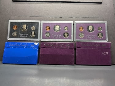 1983-S, 84-S, and 85-S Proof Sets. Original boxes. GEM.?