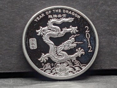 1 Troy Oz. .999 FINE SILVER 2012 Year of the Dragon Designed Round