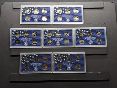 Lot of Seven Various Statehood Quarter U.S. Proof Sets - 2000-S, 2001-S, 2002-S, 2004-S, 2005-S,