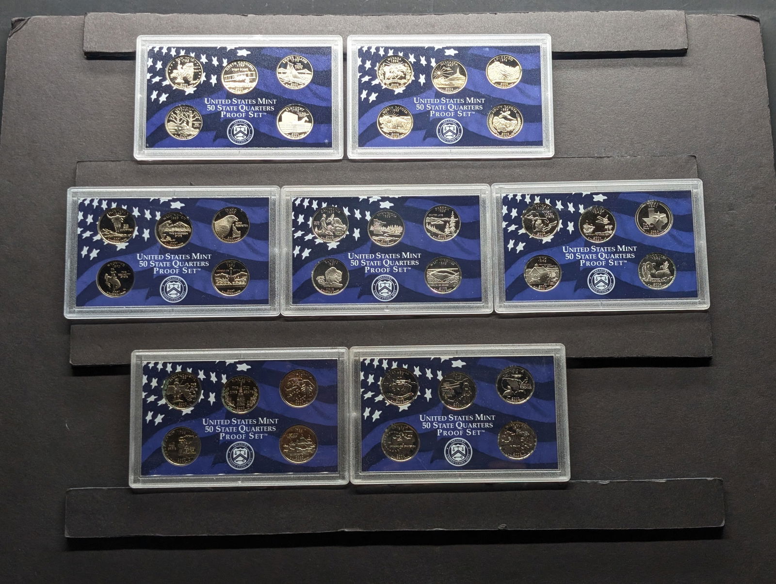 Lot of Seven Various Statehood Quarter U.S. Proof Sets - 2000-S, 2001-S, 2002-S, 2004-S, 2005-S, (1 of 9)