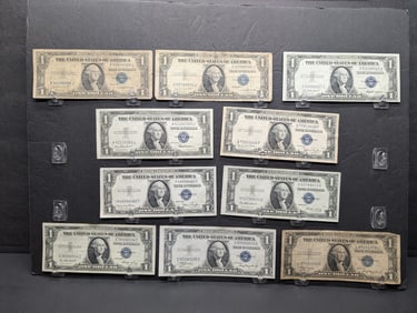 Ten 1935 $1 silver certificates: 2-A. 2-D, 2-E, 2-F, and 2-G. Seven are crispy.?