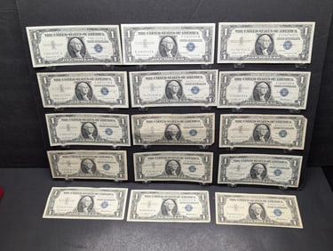 Fifteen 1957 $1 silver certificates: five 1957, five 1957A, and five 1957 B. Nice circs.?