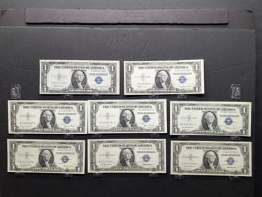 Eight 1935 $1 silver certificates: 2-A, 2-D, 2-E, and 2-F. All choice crisp uncirculated.?