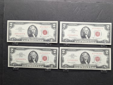 Four 1963 $2 US Red Seal Notes: two 1963 and two 1963 A. All choice crisp uncirculated.?