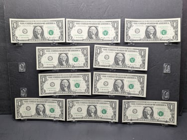 Ten consecutive serial number $1 Federal Reserve Notes. All 2006 Chicago STAR replacement notes. GEM