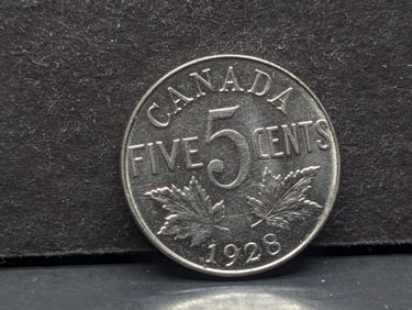 1928 Canada Nickel. Uncirculated with luster.?