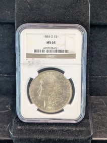 1884-O Silver Morgan Dollar. NGC Graded MS64 EX Fine Strike