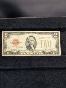 1928D Red Seal 2 Dollar Bill. In good shape with no tears or writing.?