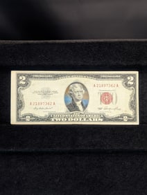 1953 Red Seal 2 Dollar Bill. In good shape with no tears or writing.??