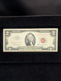 1963 Red Seal 2 Dollar Bill. In good shape with no tears or writing.?