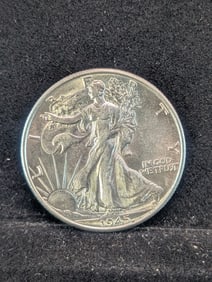 1945 Uncirculated Walking Liberty Half Dollar.