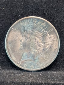 1925 Brilliant Uncirculated Peace Silver Dollar. Semi-Key Date.